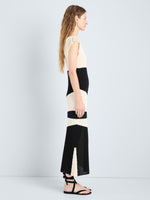 Proenza Schouler Side full length image of model wearing Saskia Dress in Textured Fringe Intarsia in Sand Multi