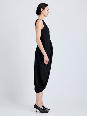 Proenza Schouler Side full length image of model wearing Sukki Dress in Draped Viscose in Black