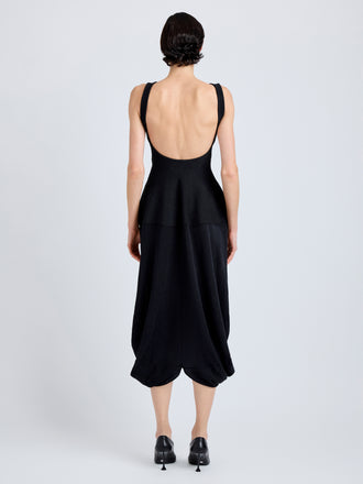 Proenza Schouler Back full length image of model wearing Sukki Dress in Draped Viscose in Black