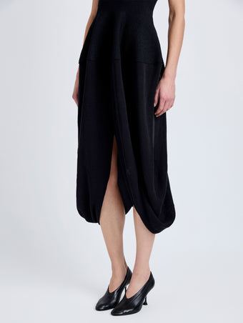 Proenza Schouler Detail image of model wearing Sukki Dress in Draped Viscose in Black
