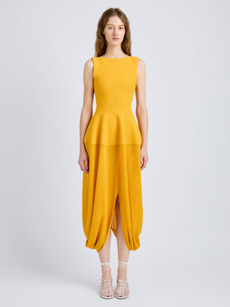 Proenza Schouler Front full length image of model wearing Sukki Dress in Draped Viscose in Marigold
