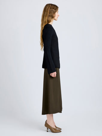 Proenza Schouler Side full length image of model wearing Sukki Jacket in Draped Viscose in Black