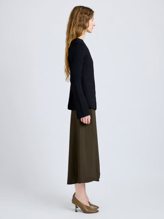 Proenza Schouler Side full length image of model wearing Sukki Jacket in Draped Viscose in Black