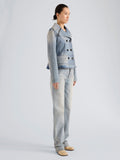 Proenza Schouler Side full length image of model wearing Tabetha Jean in Rigid Denim in Light Vintage Blue Wash