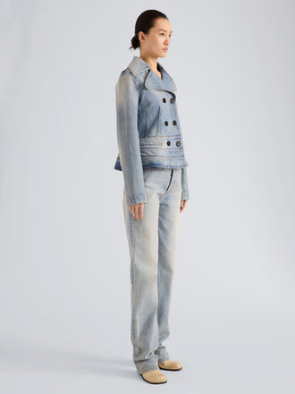 Proenza Schouler Side full length image of model wearing Tabetha Jean in Rigid Denim in Light Vintage Blue Wash