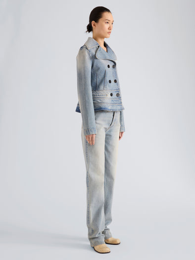 Proenza Schouler Side full length image of model wearing Tabetha Jean in Rigid Denim in Light Vintage Blue Wash