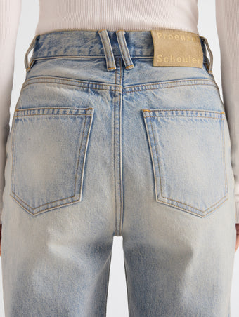 Proenza Schouler Detail image of model wearing Tabetha Jean in Rigid Denim in Light Vintage Blue Wash