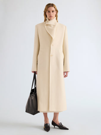 Proenza Schouler Front full length image of model wearing Alix Coat in Compact Melton Wool in Ivory