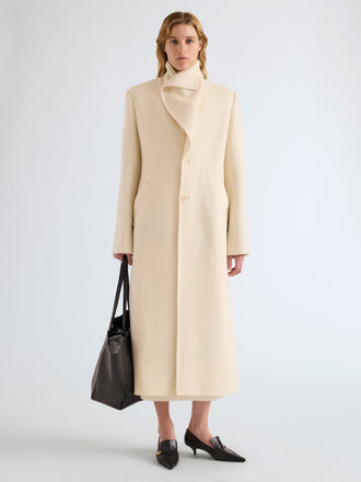 Proenza Schouler Front full length image of model wearing Alix Coat in Compact Melton Wool in Ivory
