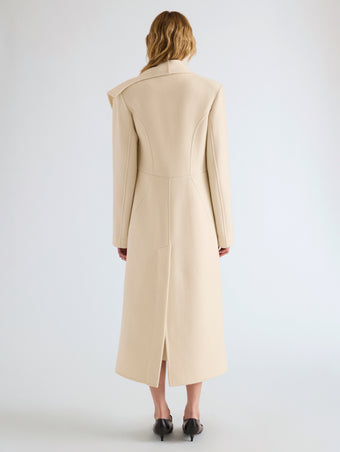 Proenza Schouler Back full length image of model wearing Alix Coat in Compact Melton Wool in Ivory