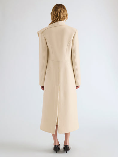 Proenza Schouler Back full length image of model wearing Alix Coat in Compact Melton Wool in Ivory