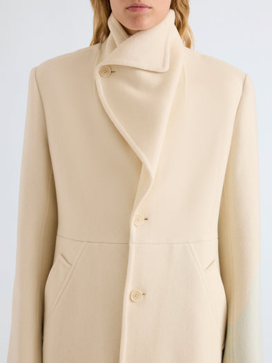 Proenza Schouler Detail image of model wearing Alix Coat in Compact Melton Wool in Ivory