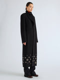 Proenza Schouler Side full length image of model wearing Alix Coat in Compact Melton Wool in Black