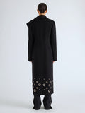 Proenza Schouler Back full length image of model wearing Alix Coat in Compact Melton Wool in Black