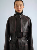 Proenza Schouler Front cropped image of model wearing Kasia Coat in Burnished Leather in Amarone Black