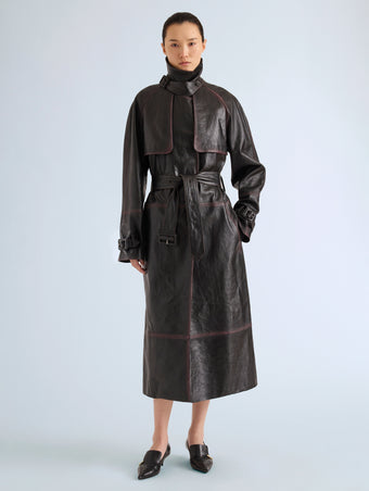 Proenza Schouler Front full length image of model wearing Kasia Coat in Burnished Leather in Amarone Black