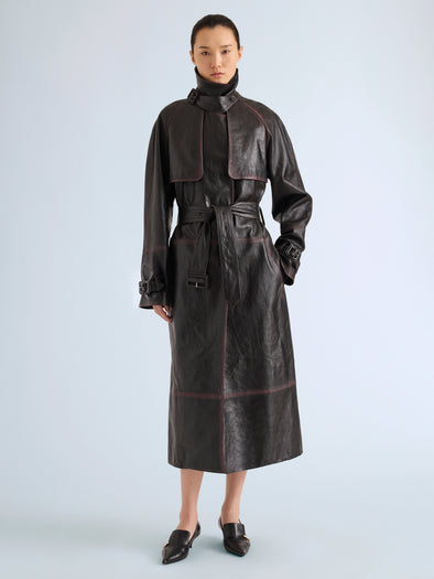 Proenza Schouler Front full length image of model wearing Kasia Coat in Burnished Leather in Amarone Black