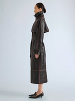 Proenza Schouler Side full length image of model wearing Kasia Coat in Burnished Leather in Amarone Black