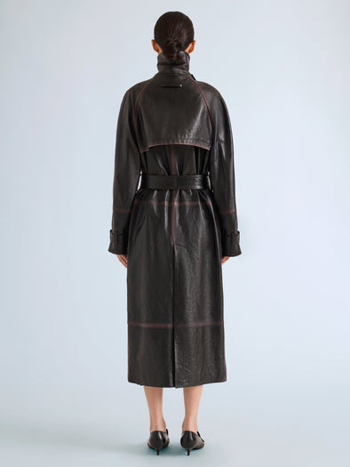 Proenza Schouler Back full length image of model wearing Kasia Coat in Burnished Leather in Amarone Black
