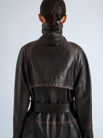 Proenza Schouler Detail image of model wearing Kasia Coat in Burnished Leather in Amarone Black