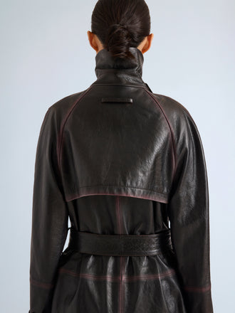 Proenza Schouler Detail image of model wearing Kasia Coat in Burnished Leather in Amarone Black