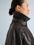 Proenza Schouler Detail image of model wearing Kasia Coat in Burnished Leather in Amarone Black