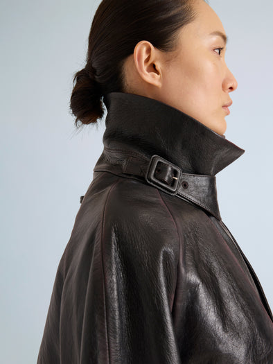 Proenza Schouler Detail image of model wearing Kasia Coat in Burnished Leather in Amarone Black