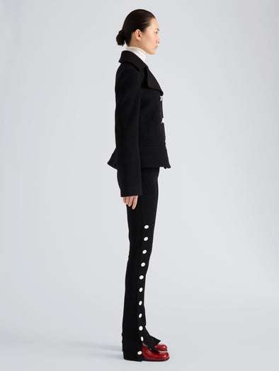 Proenza Schouler Side full length image of model wearing Romane Jacket in Compact Melton Wool in Black