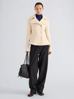 Proenza Schouler Front full length image of model wearing Romane Jacket in Compact Melton Wool in Ivory