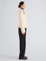 Proenza Schouler Side full length image of model wearing Romane Jacket in Compact Melton Wool in Ivory