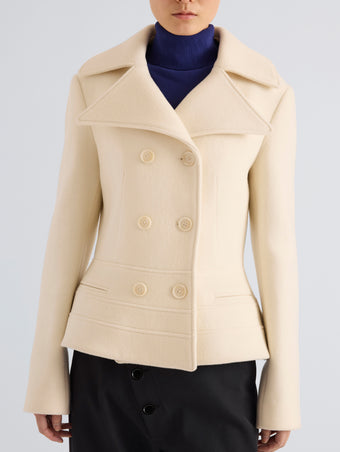 Proenza Schouler Detail image of model wearing Romane Jacket in Compact Melton Wool in Ivory