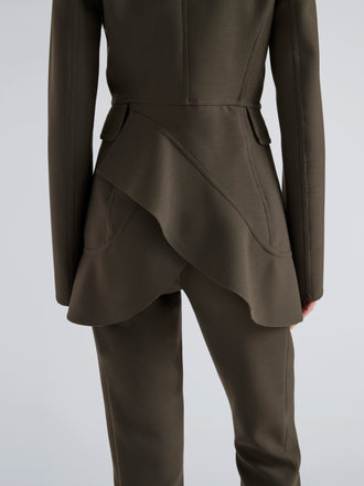 Proenza Schouler Detail image of model wearing Maera Jacket in Bi-Stretch Double Wool in Earth