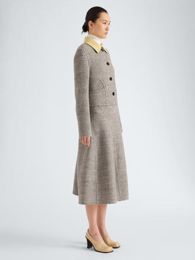 Proenza Schouler Side full length image of model wearing Gaelle Jacket in Double Face Melange Outerwear in Ecru Tahini Multi