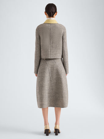 Proenza Schouler Back full length image of model wearing Gaelle Jacket in Double Face Melange Outerwear in Ecru Tahini Multi
