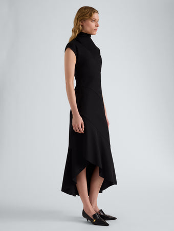 Proenza Schouler Side full length image of model wearing Elodine Dress in Tropical Wool in Black