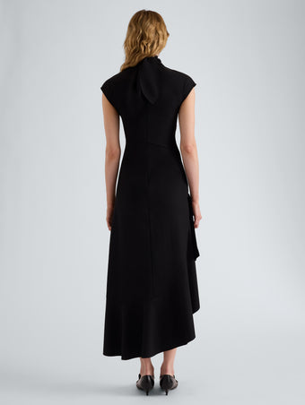 Proenza Schouler Back full length image of model wearing Elodine Dress in Tropical Wool in Black