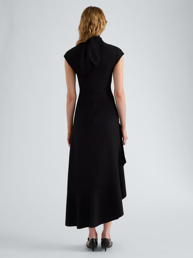 Proenza Schouler Back full length image of model wearing Elodine Dress in Tropical Wool in Black