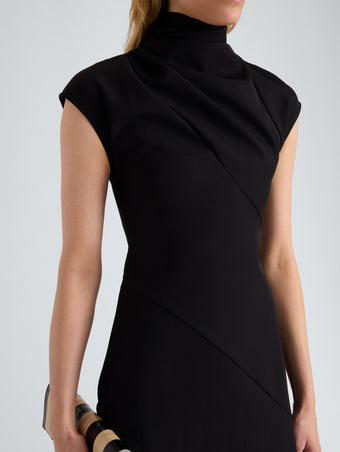 Proenza Schouler Detail image of model wearing Elodine Dress in Tropical Wool in Black