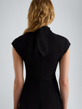 Proenza Schouler Detail image of model wearing Elodine Dress in Tropical Wool in Black