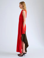 Proenza Schouler Side full length image of model wearing Isoria Dress in Solid Satin in Flame