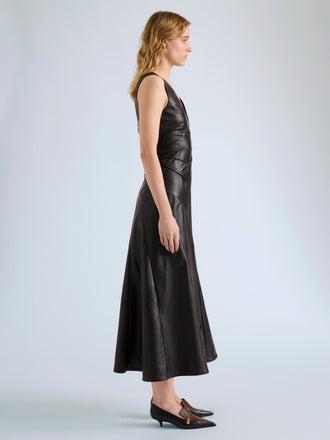 Proenza Schouler Side full length image of model wearing Kenza Dress in Nappa Leather in Black