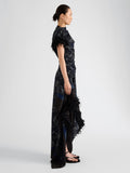 Proenza Schouler Side full length image of model wearing Bodine Dress in Printed Stretch Cady in Ink Multi