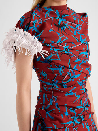 Proenza Schouler Detail image of model wearing Bodine Dress in Printed Stretch Cady in Madder Multi