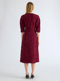 Proenza Schouler Back full length image of model wearing Alin Dress in Crushed Silk in Wine