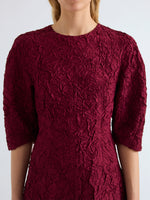 Proenza Schouler Detail image of model wearing Alin Dress in Crushed Silk in Wine