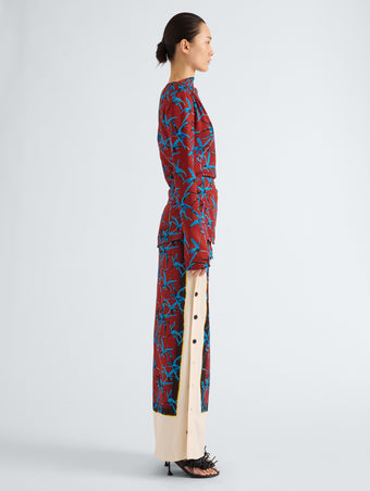 Proenza Schouler Side full length image of model wearing Anais Top in in Printed Stretch Cady in Madder Multi