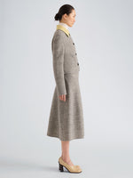 Proenza Schouler Side full length image of model wearing Gaelle Skirt in Double Face Melange Outerwear in Ecru Tahini Multi