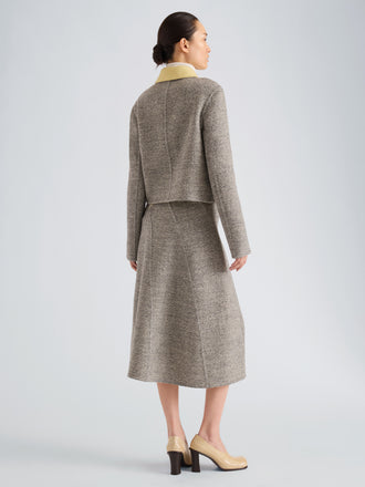 Proenza Schouler Back full length image of model wearing Gaelle Skirt in Double Face Melange Outerwear in Ecru Tahini Multi