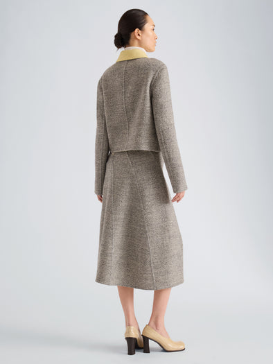 Proenza Schouler Back full length image of model wearing Gaelle Skirt in Double Face Melange Outerwear in Ecru Tahini Multi