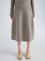 Proenza Schouler Detail image of model wearing Gaelle Skirt in Double Face Melange Outerwear in Ecru Tahini Multi